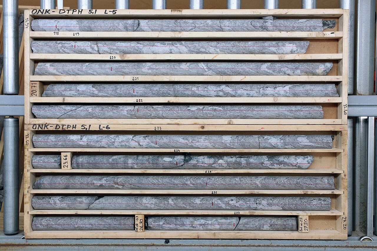 Rows of organized drill core boxes in storage from a geotechnical investigation